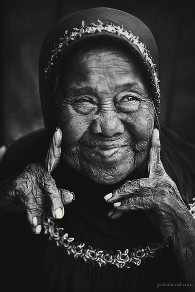 Black and white portrait of an old lady in Beringharjo market, Yogyakarta, Indonesia