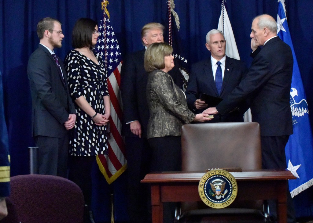 Photo of Mike Pence swearing in of retired Marine Corps General John Kelley to the office of Secretary of Homeland Security.